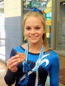 Photo of Haven Swarts with medal
